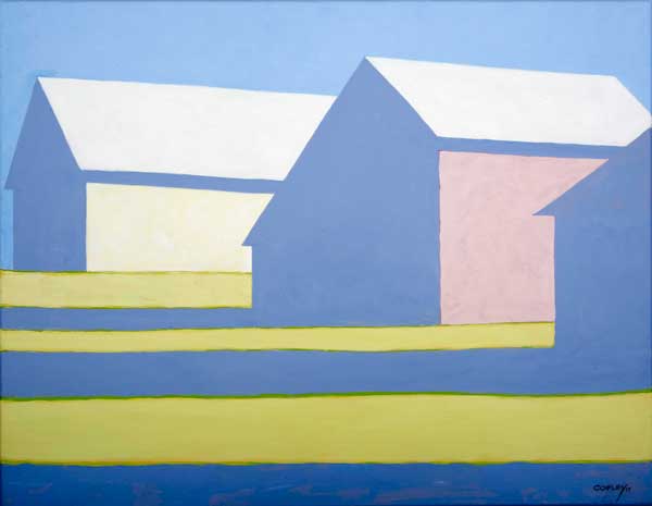 3 pastel barns heavily in shadow casting long shadows across a green lawn